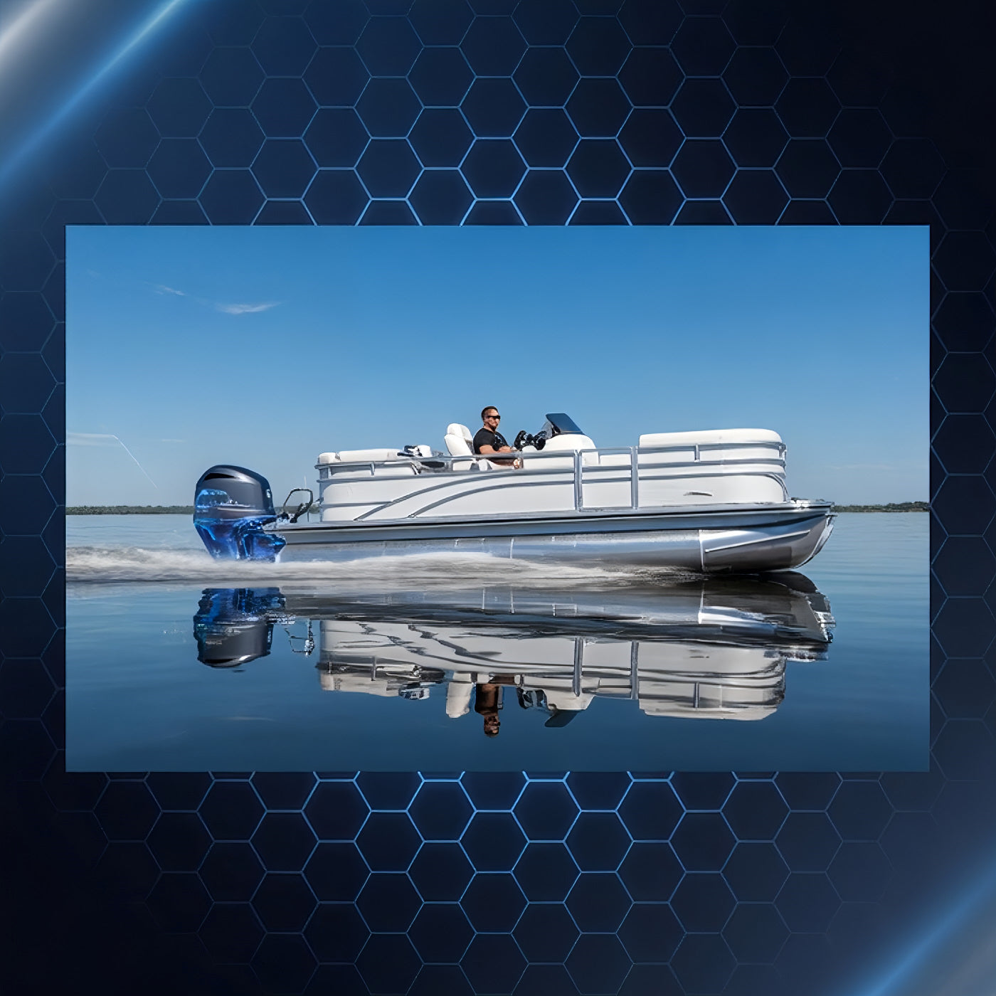 TriboDyn Marine Plus 2-Cycle Oil – low smoke and clean burning performance shown with a pontoon boat running on a calm lake under a bright sunny day