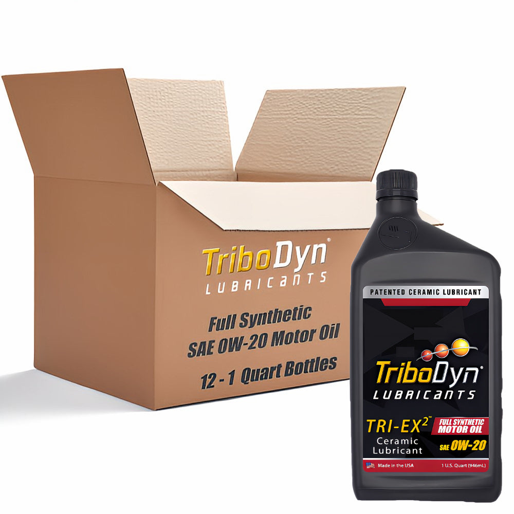 Case of 12 quarts of TriboDyn Full Synthetic 0W-20 Motor Oil with Ceramic Coating with a black 1 quart bottle sitting in front.