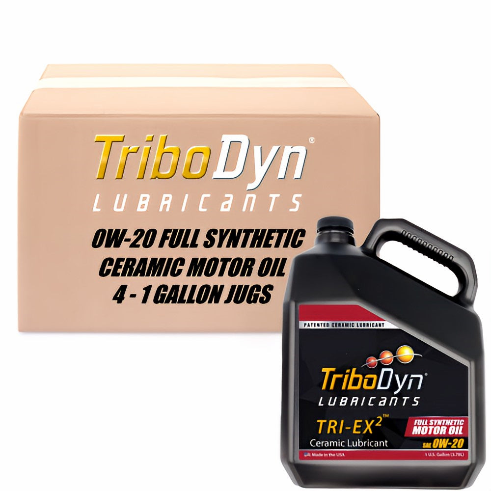 4 gallon case of TriboDyn TRI-EX2 Full Synthetic 0W-20 motor oil with ceramic coating and cardboard box with a black gallon jug in front.