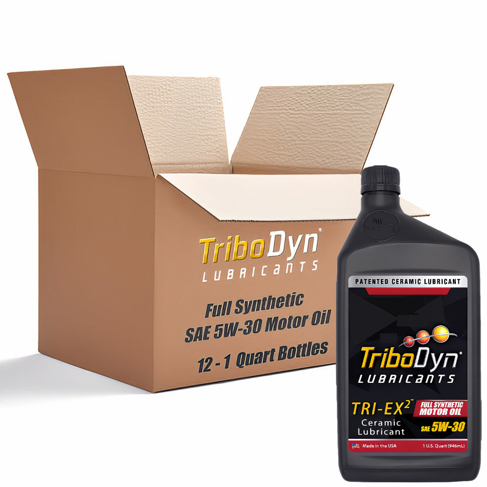 Case of 12 quarts of TriboDyn Full Synthetic 5W-30 Motor Oil with Ceramic Coating with a black 1 quart bottle sitting in front.